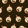 Seamless pattern with orange cup of coffee with cream and cinnamon on brown background. Royalty Free Stock Photo